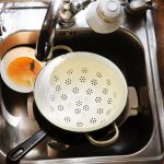 unwashed dishes on the sink